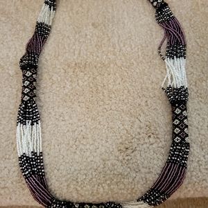 Indigenous native beaded necklace. Purple and Silver glass beads.